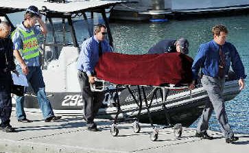 Water death: The body of a Hervey Bay man is taken ashore by water police after he died when a tinnie overturned off Point Vernon. Water death: The body of a Hervey Bay man is taken ashore by water police after he died when a tinnie overturned off Point Vernon.